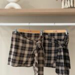 Plaid tie-front mini skirt