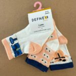 Playful baby girl high ankle socks