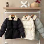 Puffer jacket with faux shearling collar