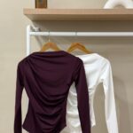 Elegant draped boat neck top