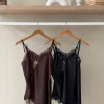 Lace trim asymmetric satin top