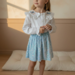 White Blouse and Blue Sequin Skirt Set