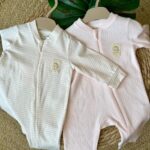 Pink baby sleepsuits (2pcs)