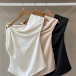 Draped satin top with gold hardware