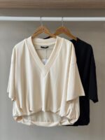 Draped hem v neck top