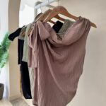 Draped one shoulder crinkle top