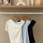 Asymetrical draped neckline top