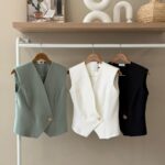 Asymmetrical single button tailored vest