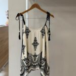 Printed reversible handkerchief hem beige and black top