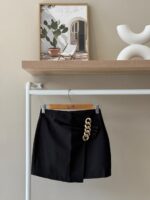 Gold chain detail mini black skirt