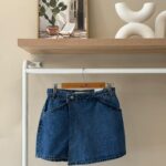 Cross front blue denim mini skort