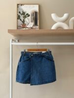 Cross front blue denim mini skort