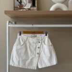 Button front asymmetrical offwhite denim skort