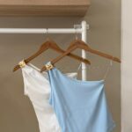 One shoulder top with gold buckle