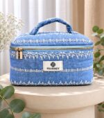 Floral embroidered blue toiletry bag