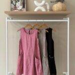 Sleeveless linen dress with button pocket detail