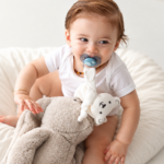 Bear pacifier holder and sleep companion